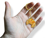 Novel Merk Croissant Enamel Keychain (Single Pack)